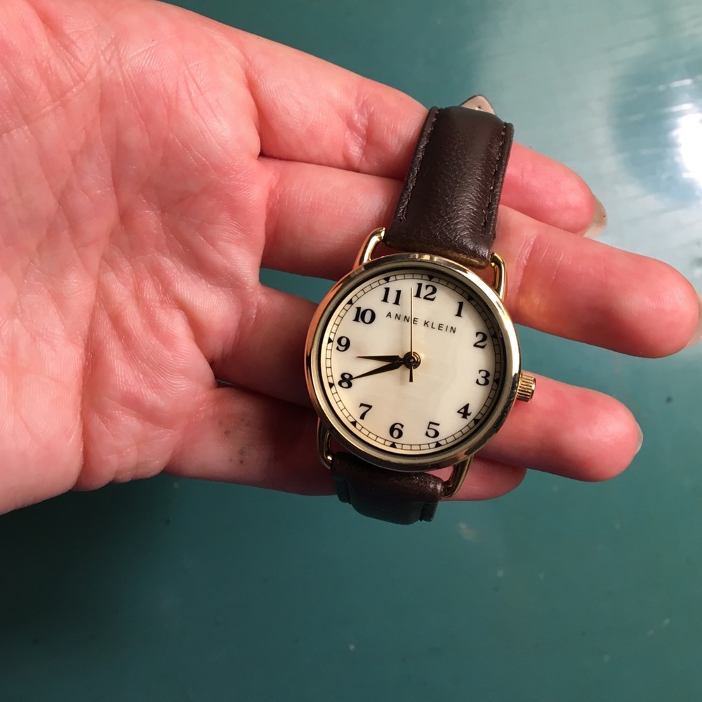 Anne Klein brown and gold watch with seashell face