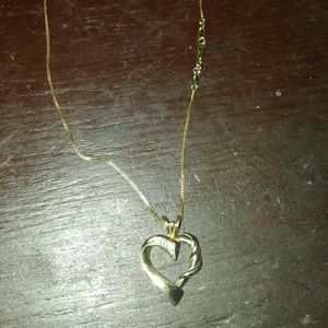 Gold and diamond heart necklace