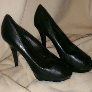 BCBG black leather pumps