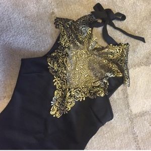 Gold Lace and black bodysuit