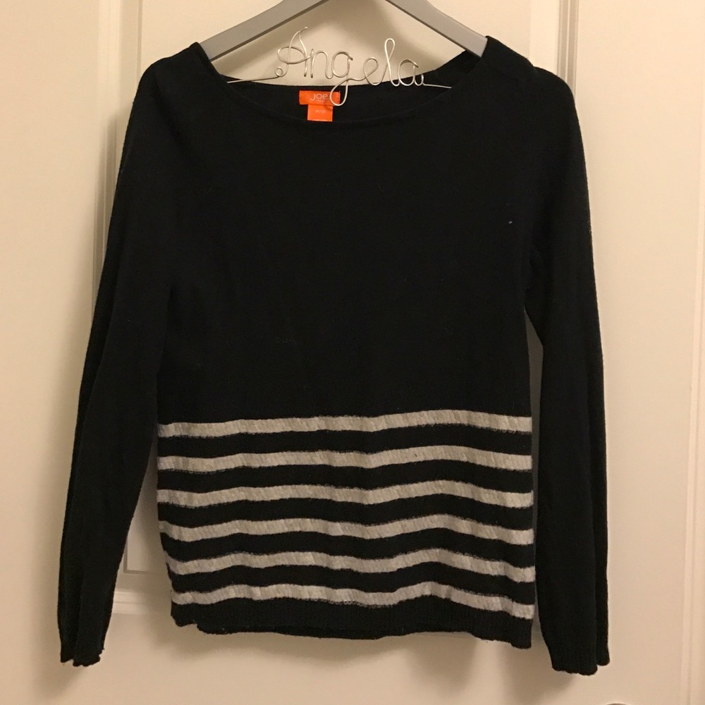 Black sweater with white strips