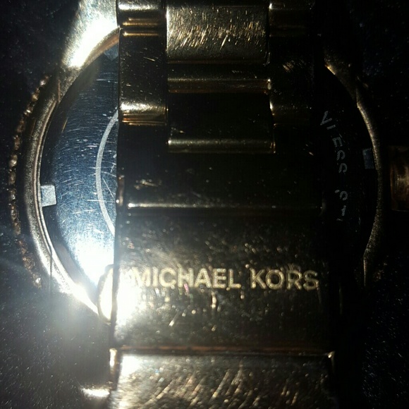 Michael kors rose gold watch coved in diamonds