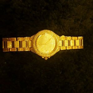 Michael kors rose gold watch coved in diamonds