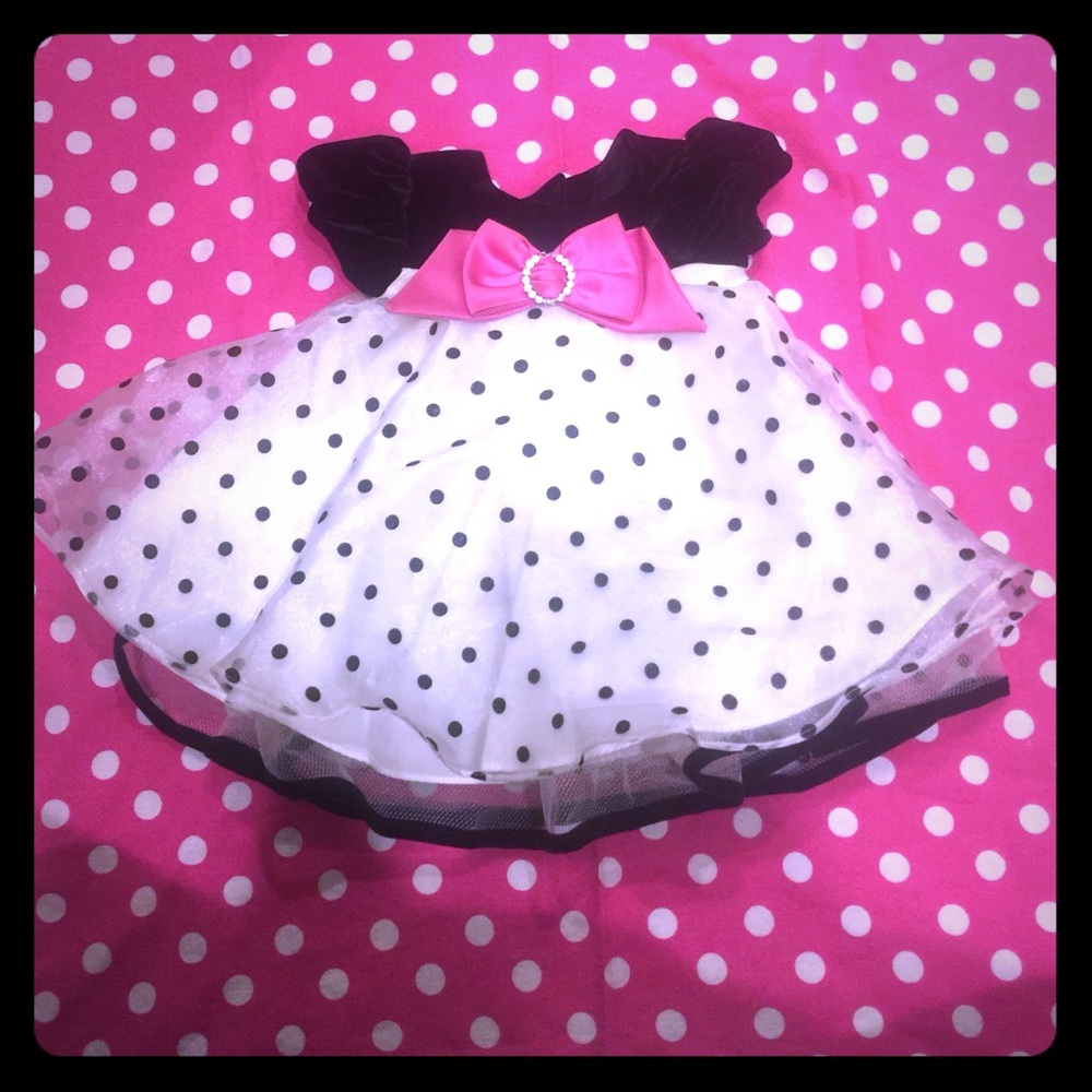 Velvet and crinoline dress with bow.