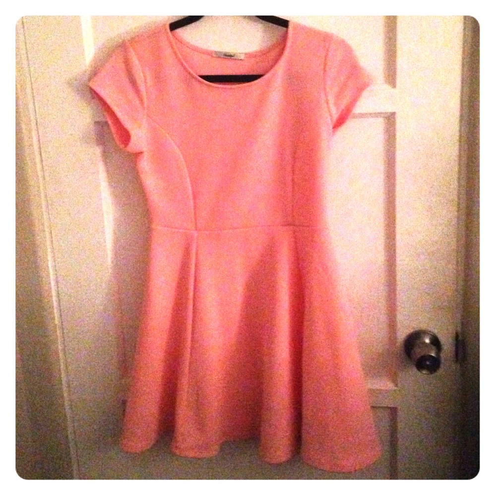 Bubblegum pink skater style dress.