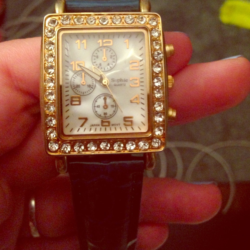 Square gold-faced watch.