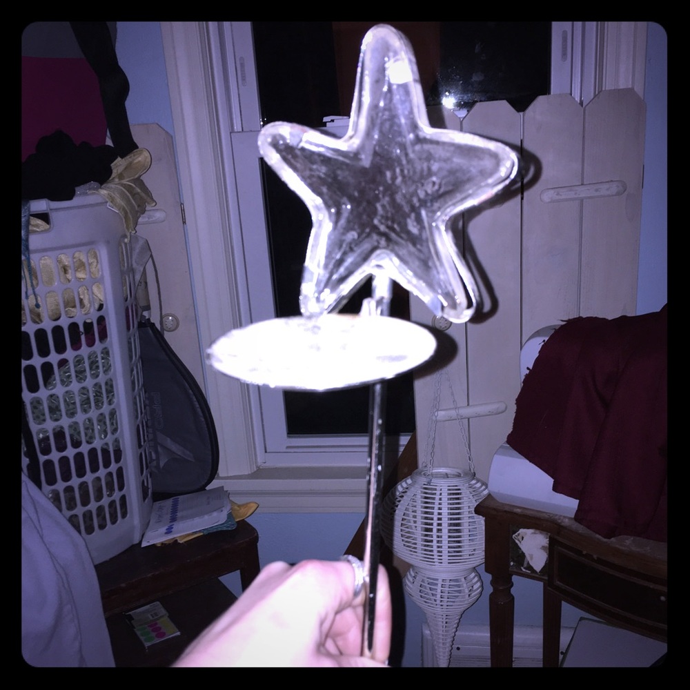 Tall clear star candle holder
