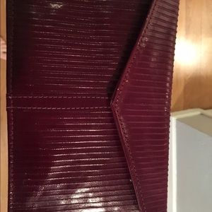Red leather clutch
