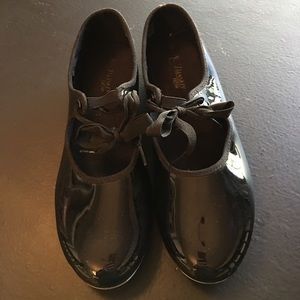 Size 6 tap shoes barely used.