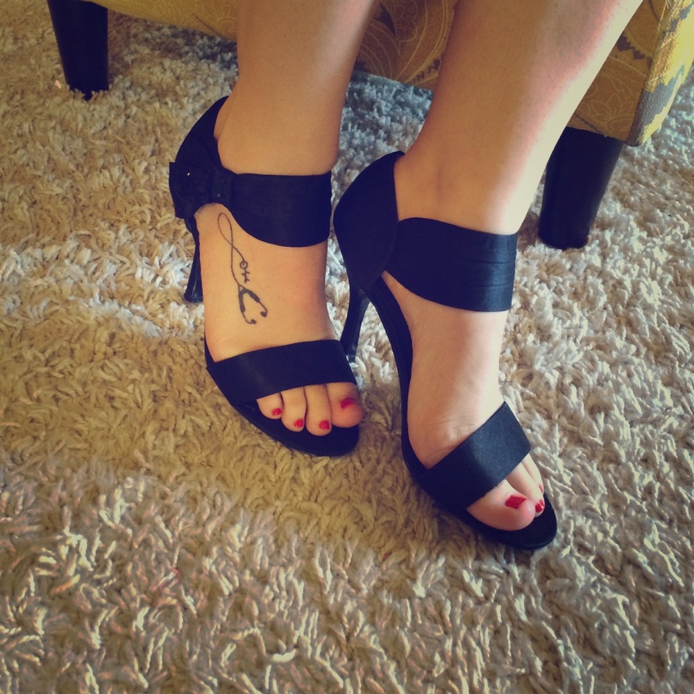 Black strap heels with rhinestones embellishment