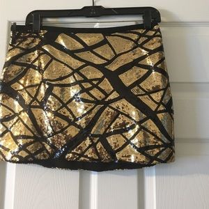 Black and gold sequins mini skirt