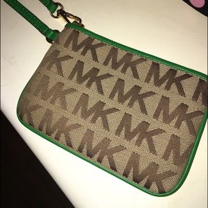 Tan and green Michael Kors wristlet
