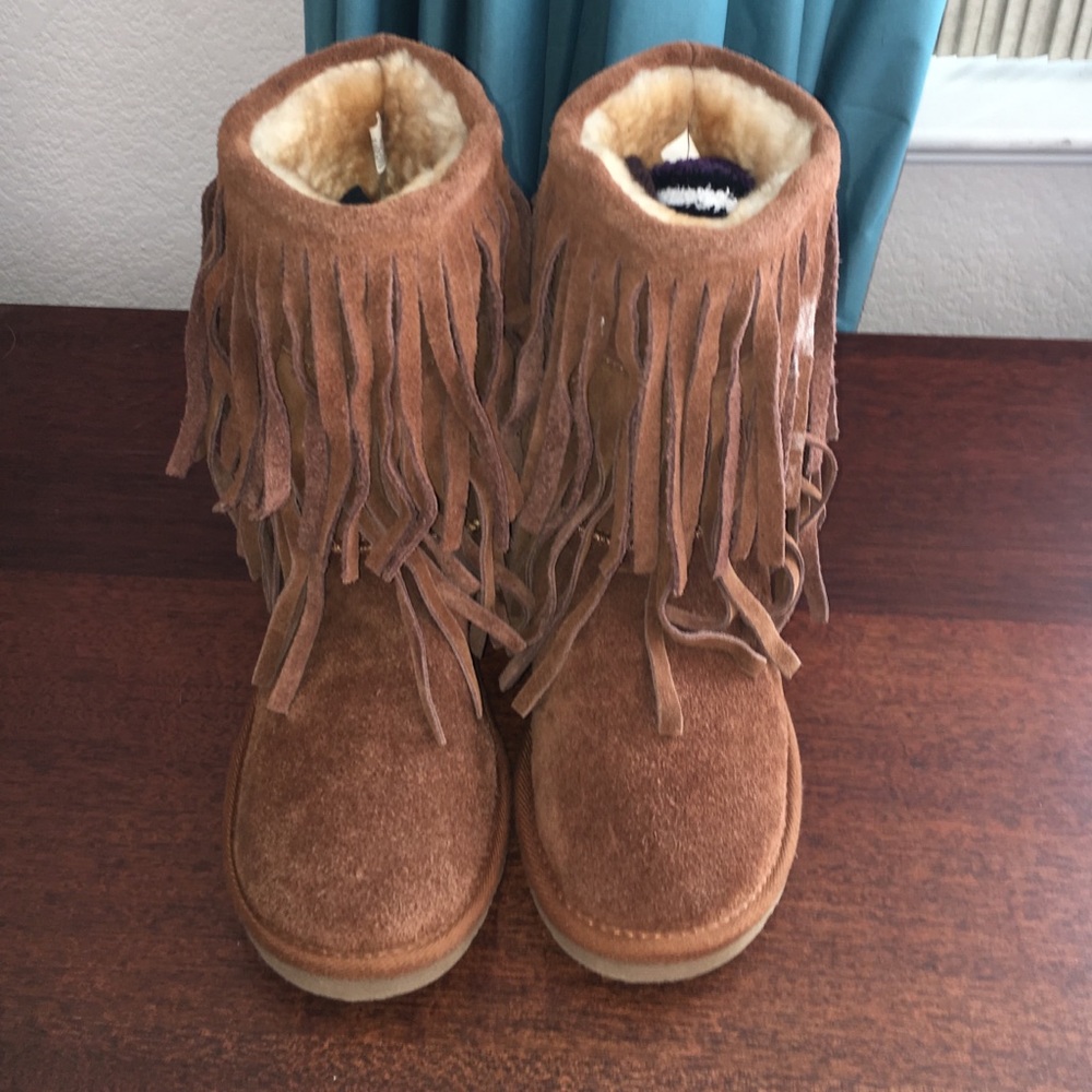 Minnetonka suede boots.