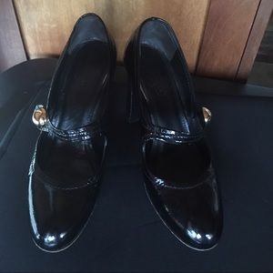Black coach patent shoes