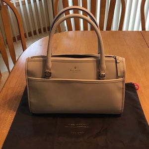 Kate Spade cream-colored purse with dust bag.