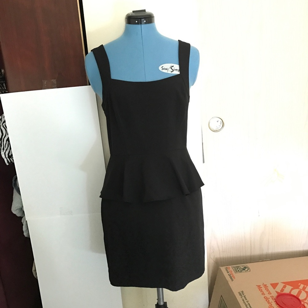 black peplum dress