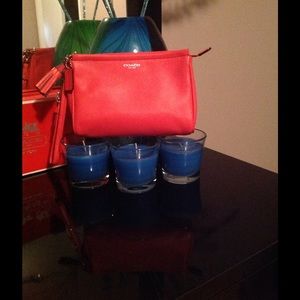 COACH CORAL LEGACY LARGE TASSEL WRISTLET CLUTCH