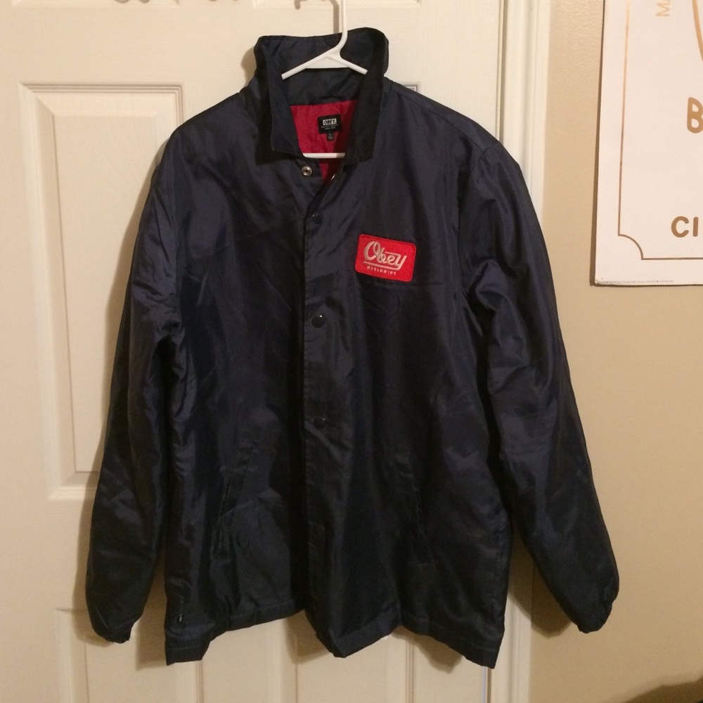 A Large Navy Blue OBEY Windbreaker