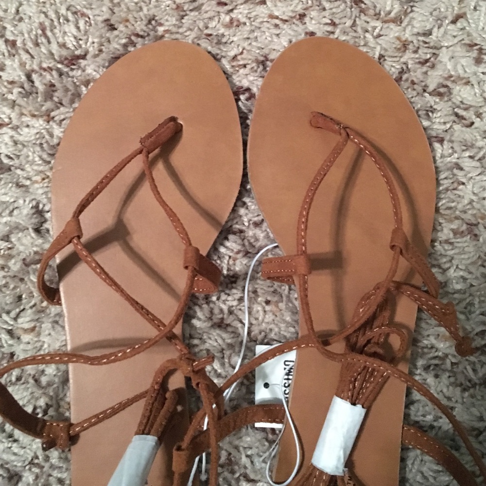 NWB lace up sandals