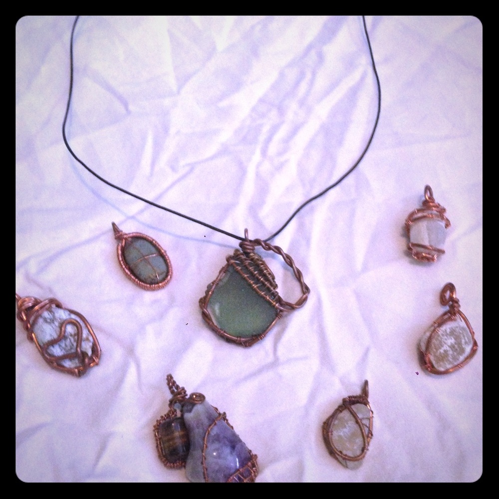 Awesome gems/rocks/sea glass wrapped in copper.