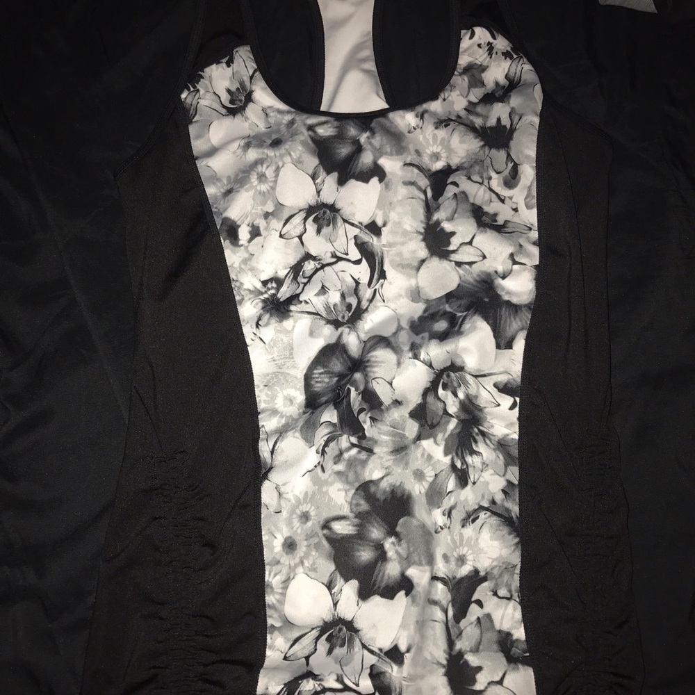 Beautiful flower detail razorback tank ideology
