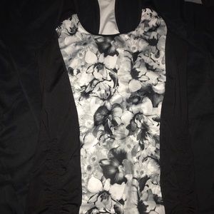 Beautiful flower detail razorback tank ideology