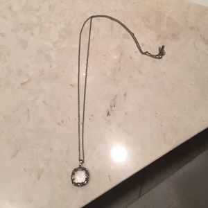Silver necklace with clear pendant