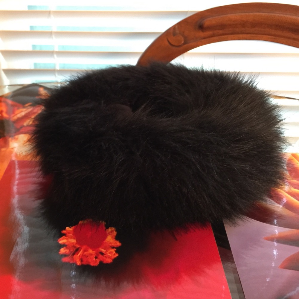 This is a cool Aldo faux fur headband type hat