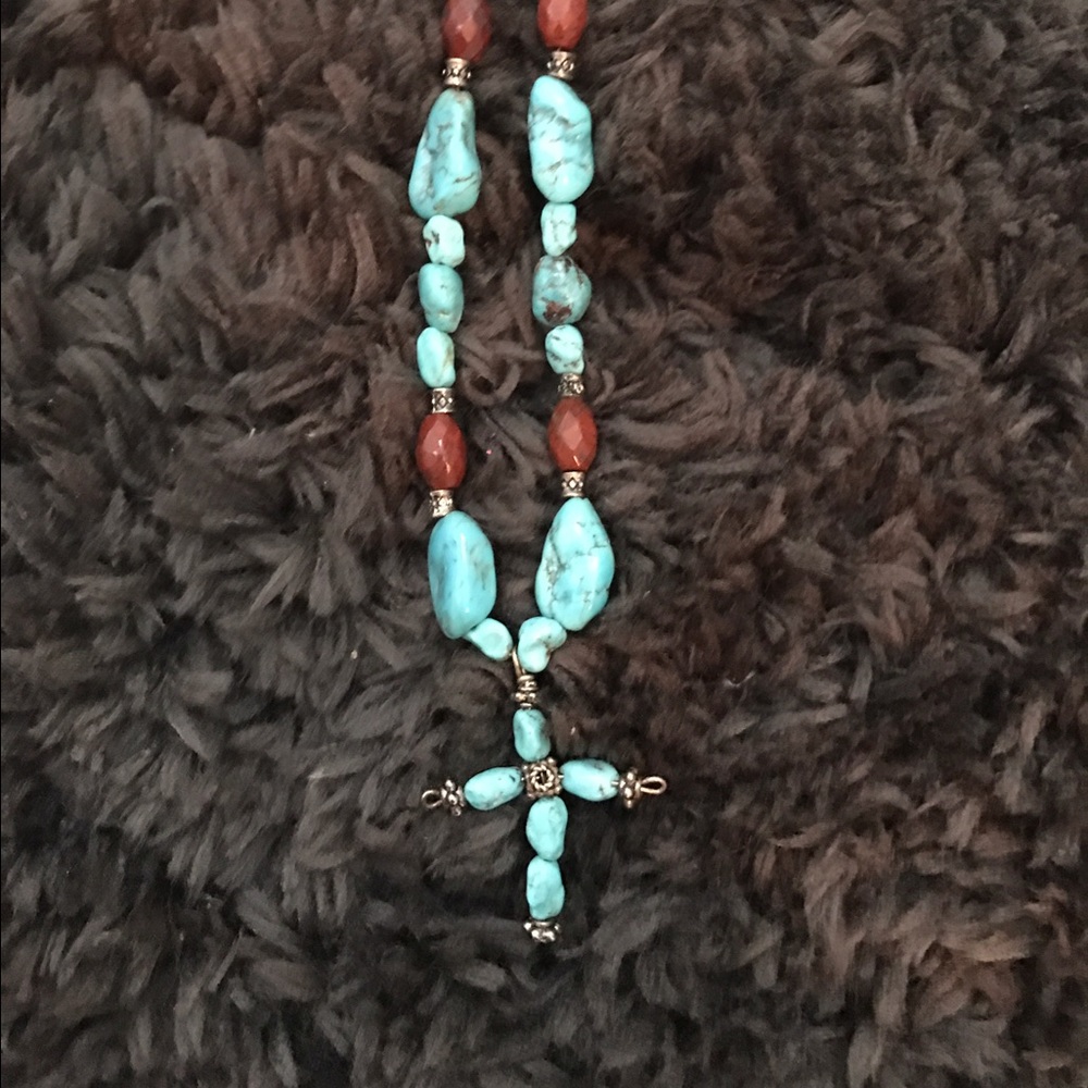 Turquoise and maroon/brown stone cross necklace
