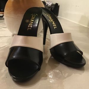 CHANEL Black and White slip on heels.