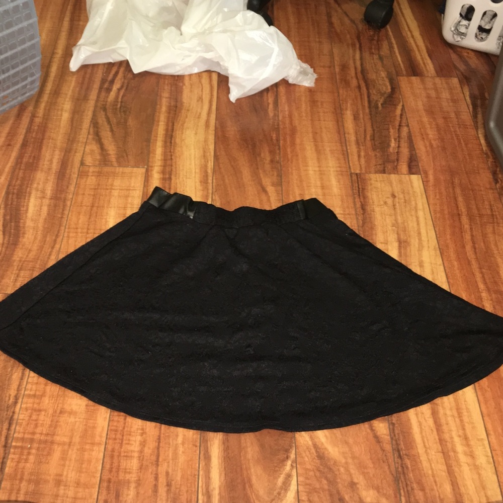 Black high waisted skirt.