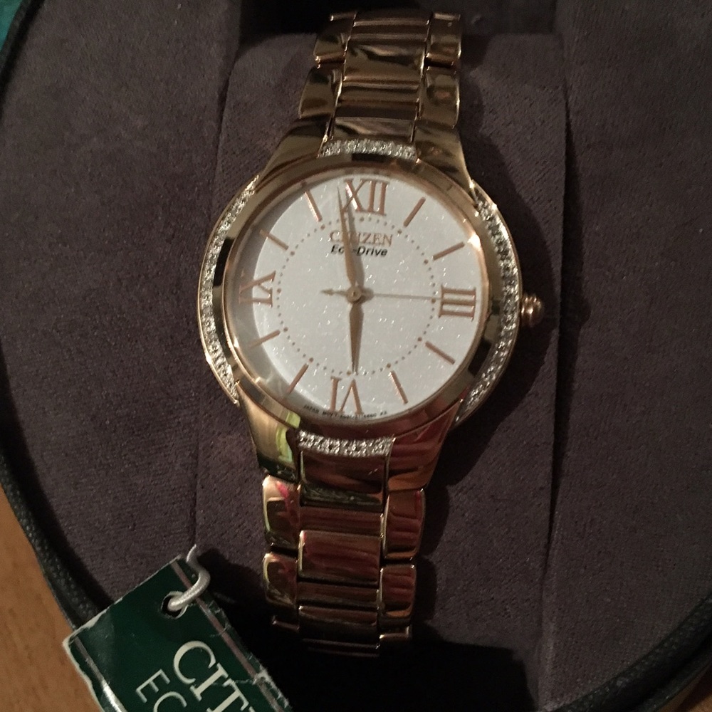Gold Citizen EcoDrive watch with genuine diamonds