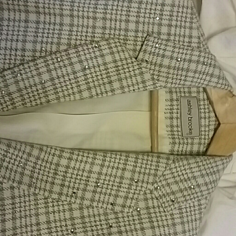 Wool/acrylic blazer with rhinestones.
