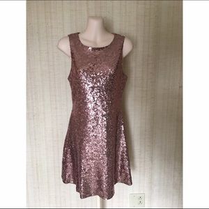 Rose gold sequins party dress.