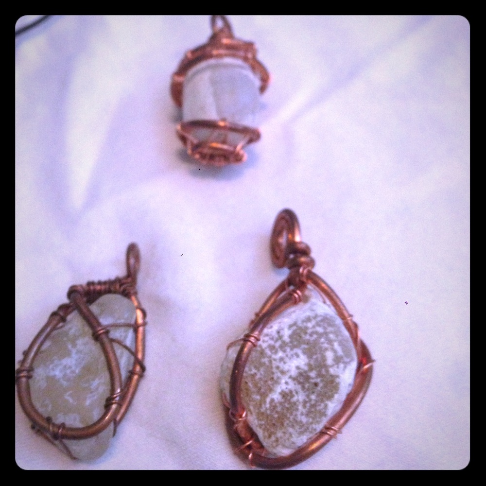 Oregon coast agate wrapped in copper pendants.