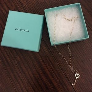 Never worn Tiffany and Co heart key necklace