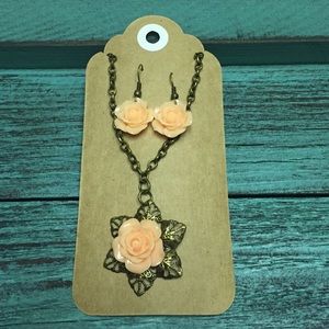 Peach floral necklace and earring set.