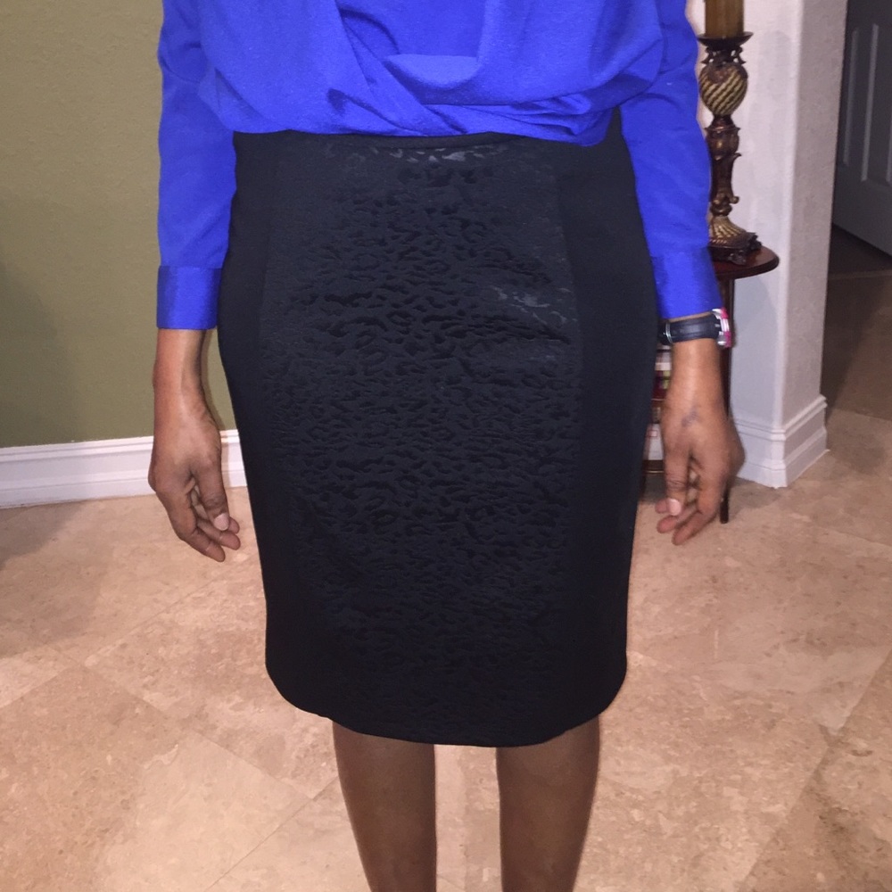 Black knee-length skirt