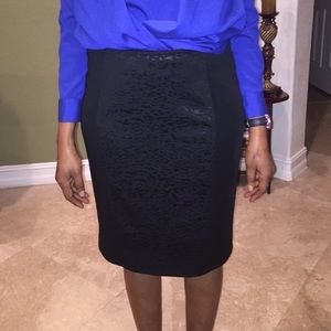 Black knee-length skirt