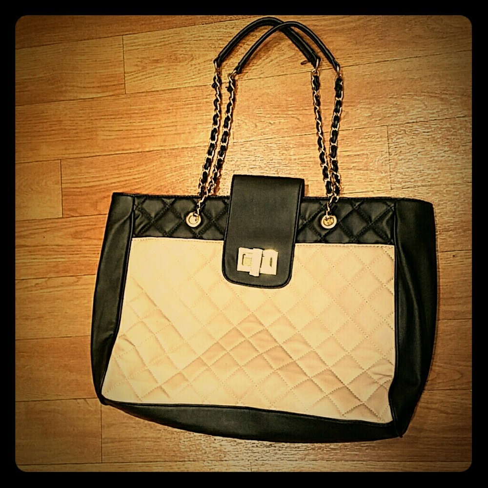 Black and nude quilted purse with gold hardware