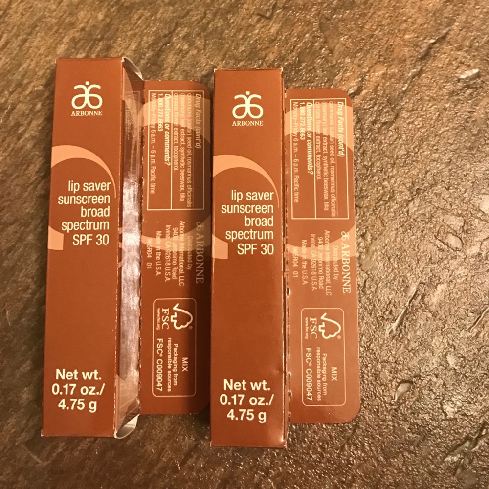 Two Arbonne lip savers