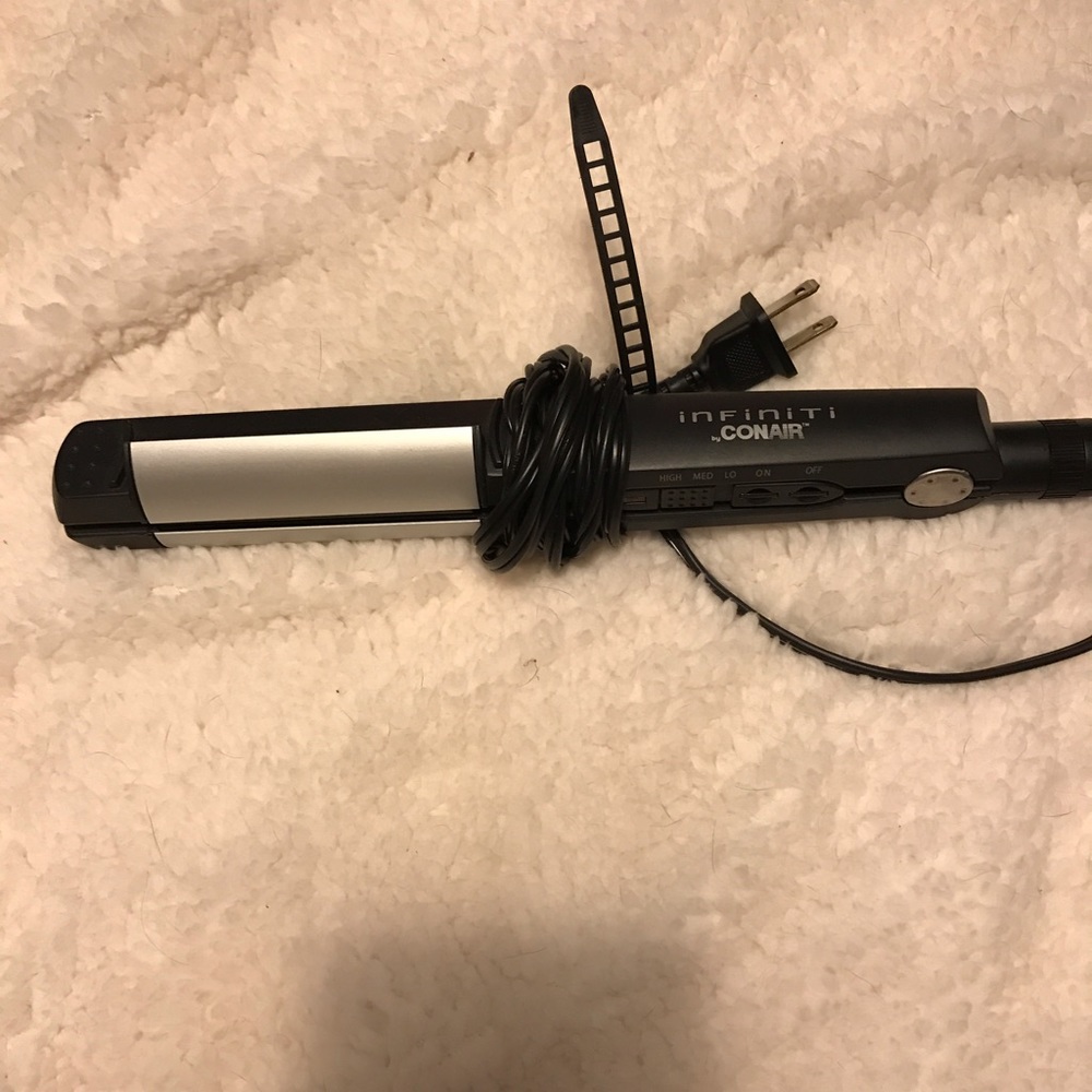 Hair straightener and curler.