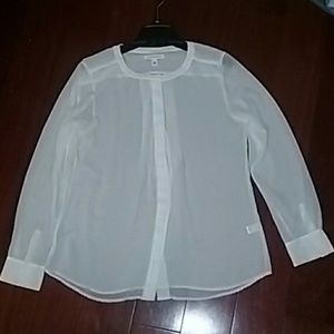 Sheer white blouse with pleated front