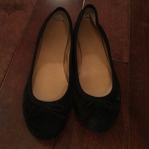 Black ballet flats with bow