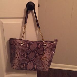 Snake skin Michael kors purse.