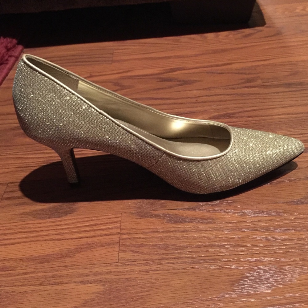 Gold low heels.