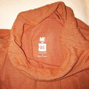 turtleneck sleeveless top