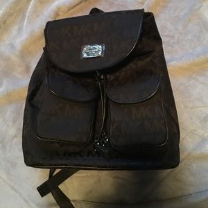Brand new Michael Kora backpack with tags
