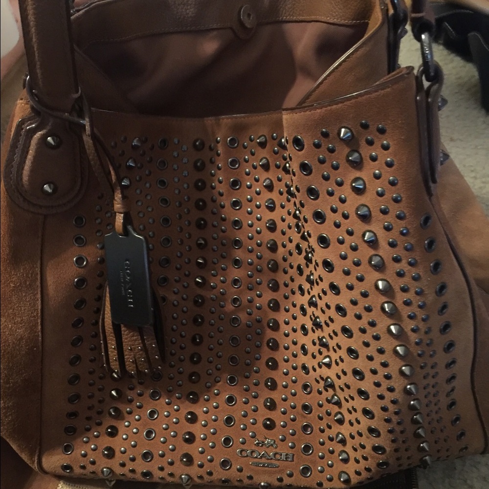 Brown studded Suede Coach purse W/tassels