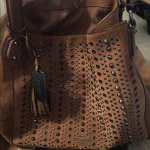 Brown studded Suede Coach purse W/tassels